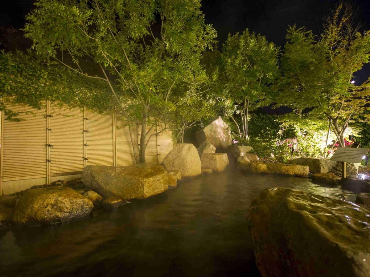 Hotel Okura Jr Huis Ten Bosch Sasebo Exteriör bild The river at night
